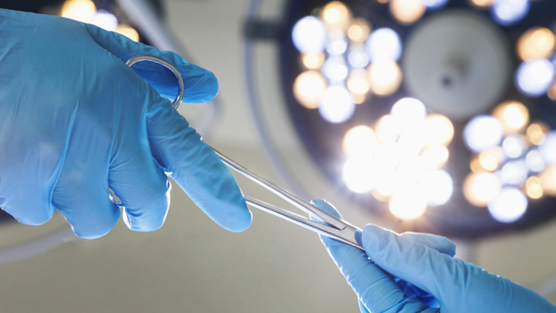 Bild Operation Handschuhe und Schere